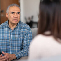 An elderly man of African descent talks to a therapist about his marriage. He is serious about working on his relationship with his wife.